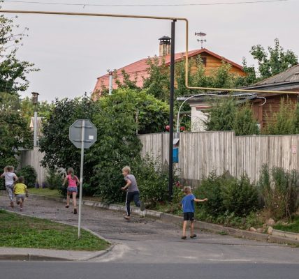a group of people walking down a street